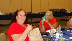 Two people sitting at a table

Description automatically generated