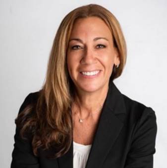 A person in a black suit

AI-generated content may be incorrect.