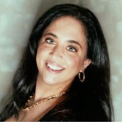 A close-up of a person smiling

AI-generated content may be incorrect.